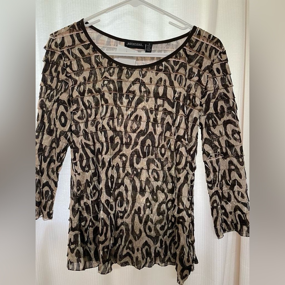 Notations size S stretch flutter top. Brand new.